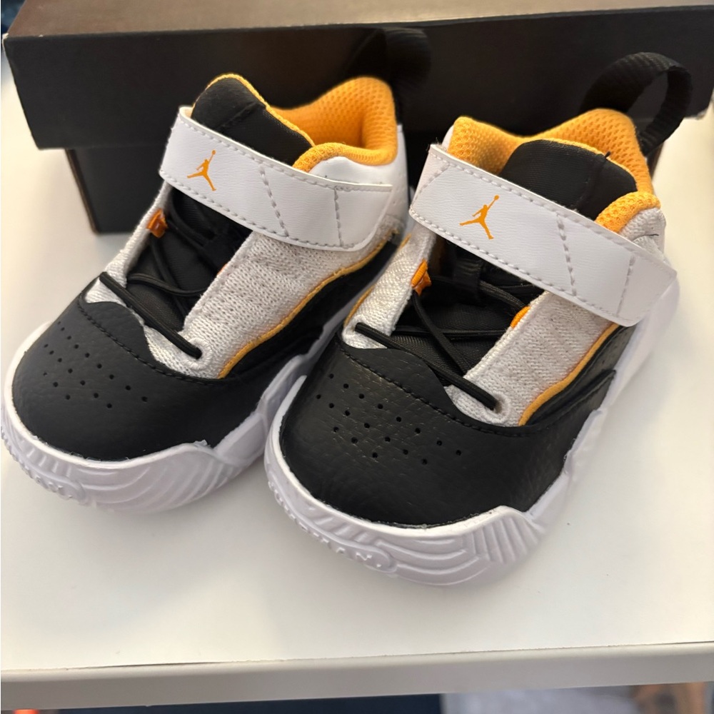 Jordan Kids Black, White, and Yellow Sneakers